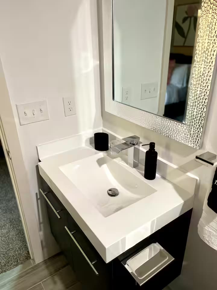 Modern All-En-Suite Home bathroom shower at a direct-booking vacation rental in Phoenix, Arizona