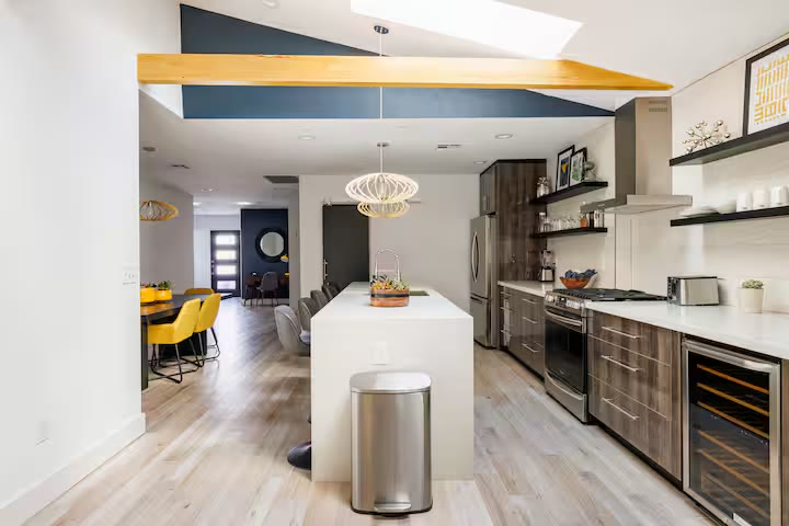 Modern All-En-Suite Home kitchen island at a direct-booking vacation rental in Phoenix, Arizona