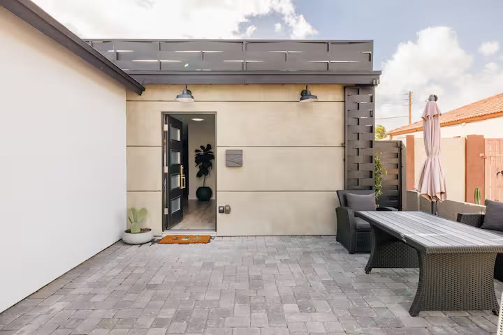 Modern All-En-Suite Home front exterior patio at a direct-booking vacation rental in Phoenix, Arizona
