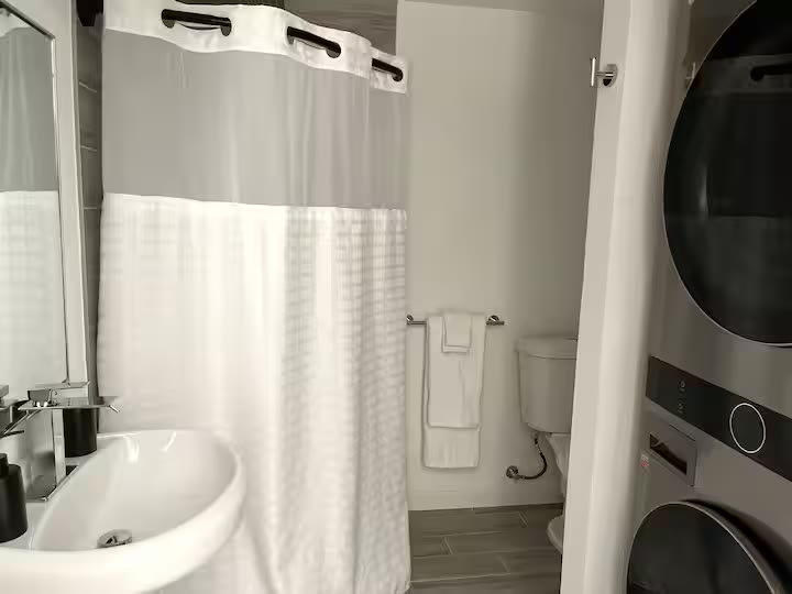 Detached Studio Guesthouse - Bathroom Laundry Detached Studio Guesthouse bathroom laundry at a direct-booking vacation rental in Phoenix, Arizona