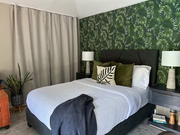 Palm Haven Pool House bedroom at a direct-booking vacation rental in Phoenix, Arizona