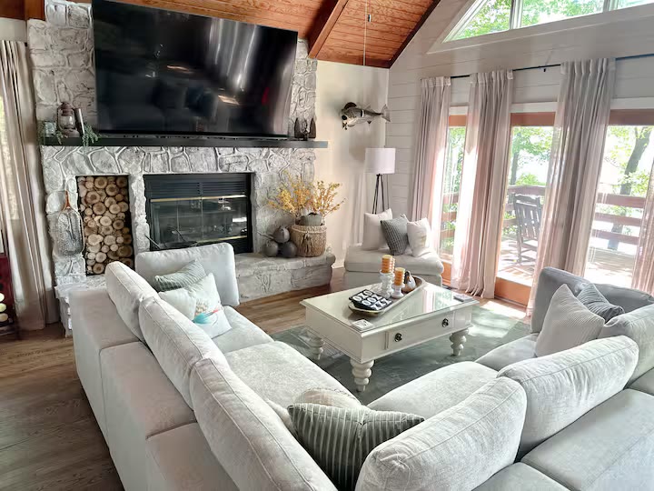 The Angler's Canoe Lake House - Living Room Windows The Angler's Canoe Lake House living room windows at a direct-booking vacation rental in Cedar Bluff, Alabama